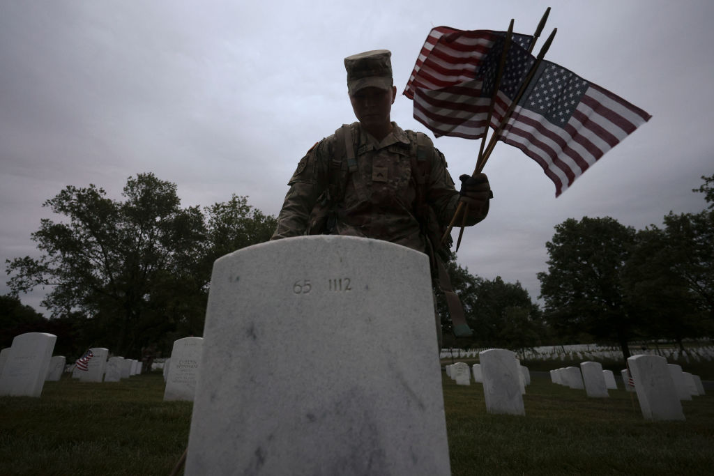 Annual Flags-In Event Held At Arlington Cemetery Ahead Of Memorial Day