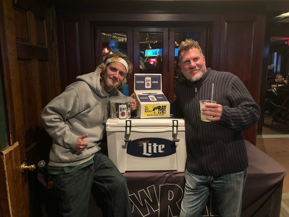 Gotts with the grand prize winner of a Miller Lite cooler