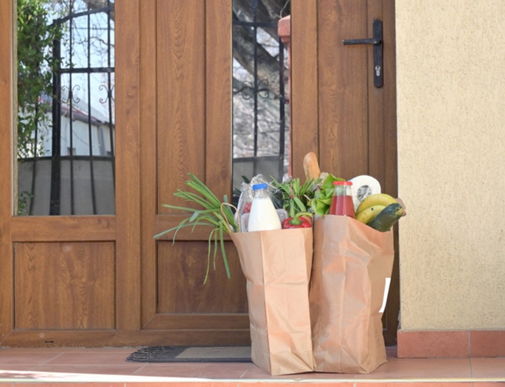 grocery delivery at door, groceries in paper bags, amazon grocery delivery
