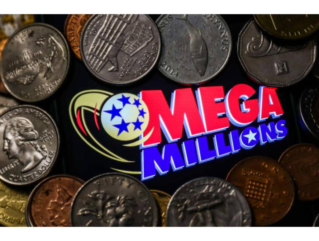 Mega Millions logo displayed on a phone screen and coins are seen in this illustration