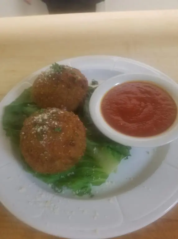 rice balls and sauce on plate 