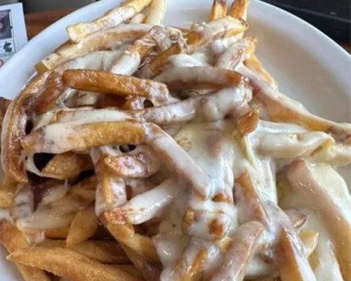 A plate of New Jersey Disco Fries in a Diner